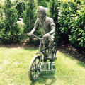 Garden park life size antique bronze boy riding bike sculpture
